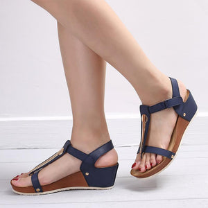Fashionable sandal with metal and Velcro closure