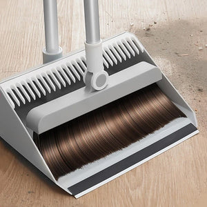 "Built-In Comb" Rotating Broom